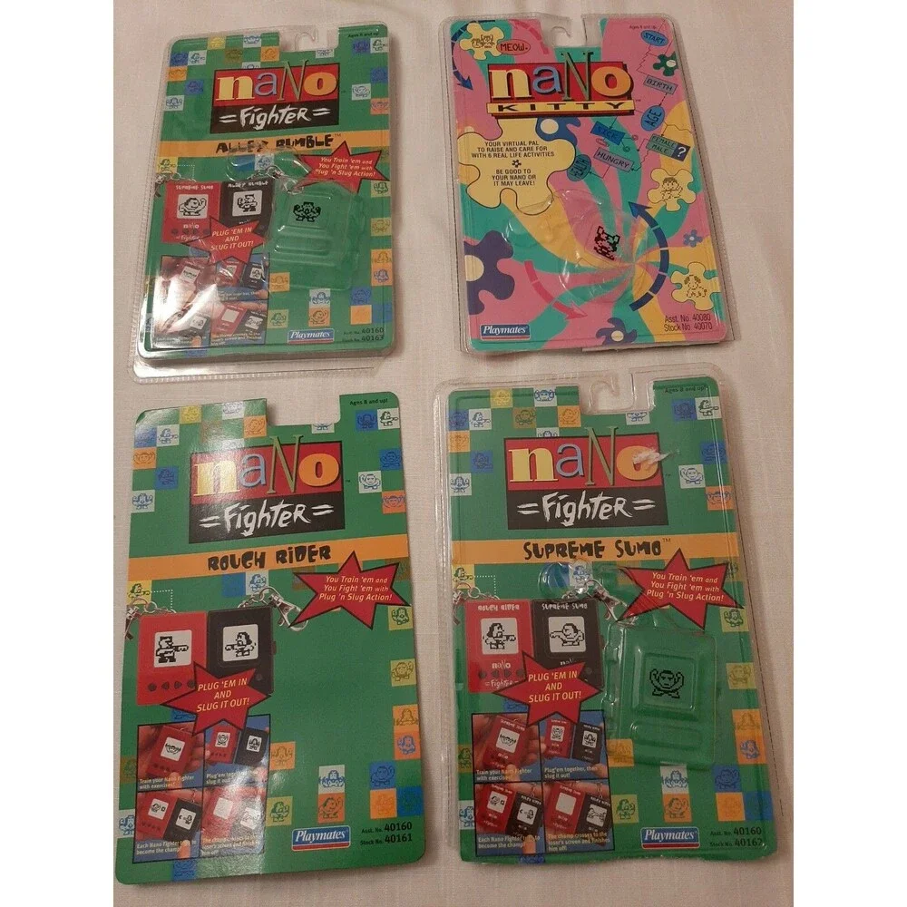 (4 EMPTY PACKAGES)1997 NANO FIGHTER SUPREME SUMO PLAYMATES MICRO PETS NANO KITTY